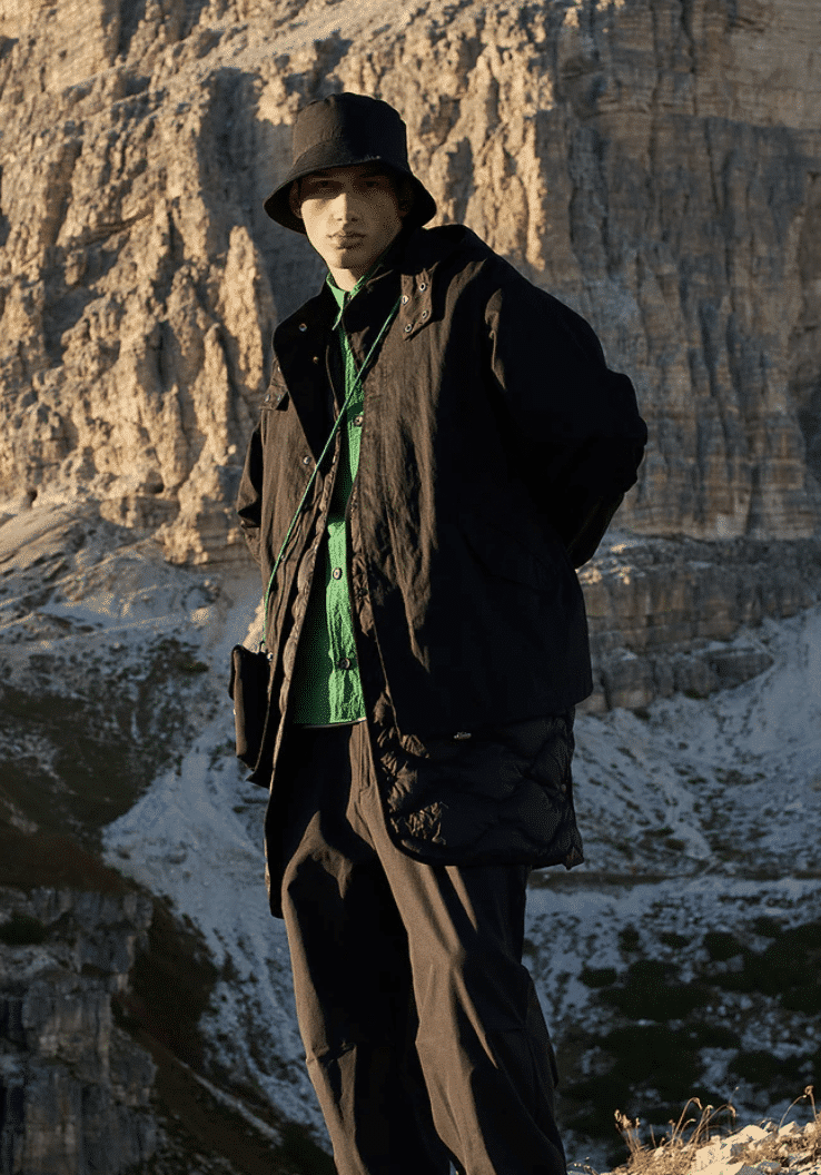 A guy standing in the nature