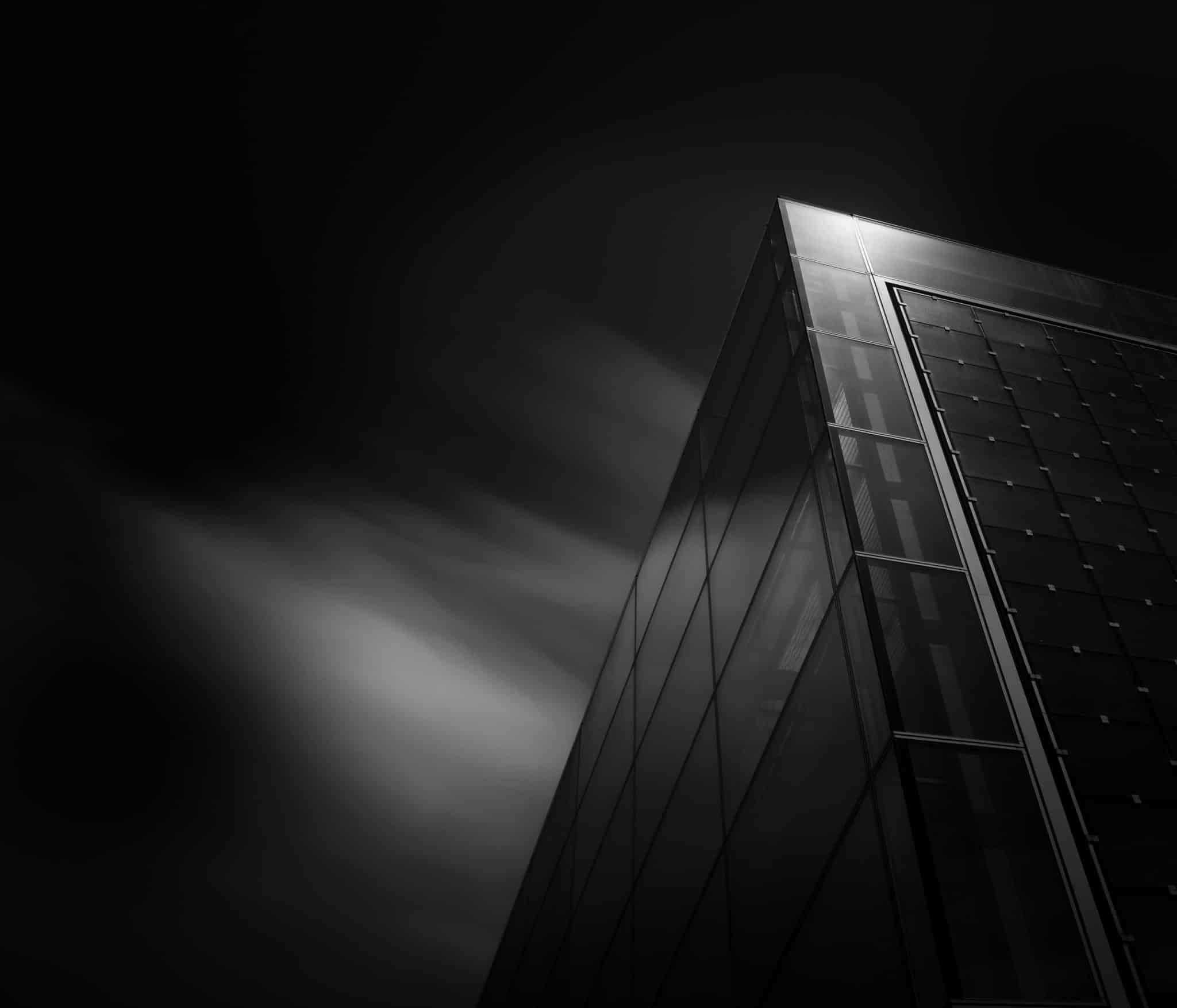 A corner of the building in black and white